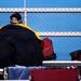 Milan High School supporter Connie Majeske tries to stay warm before the game against Tecumseh on Friday. Daniel Brenner I AnnArbor.com